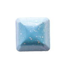 light blue square hazelnut chocolate bonbon