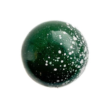 a green peppermint crunch chocolate bonbon